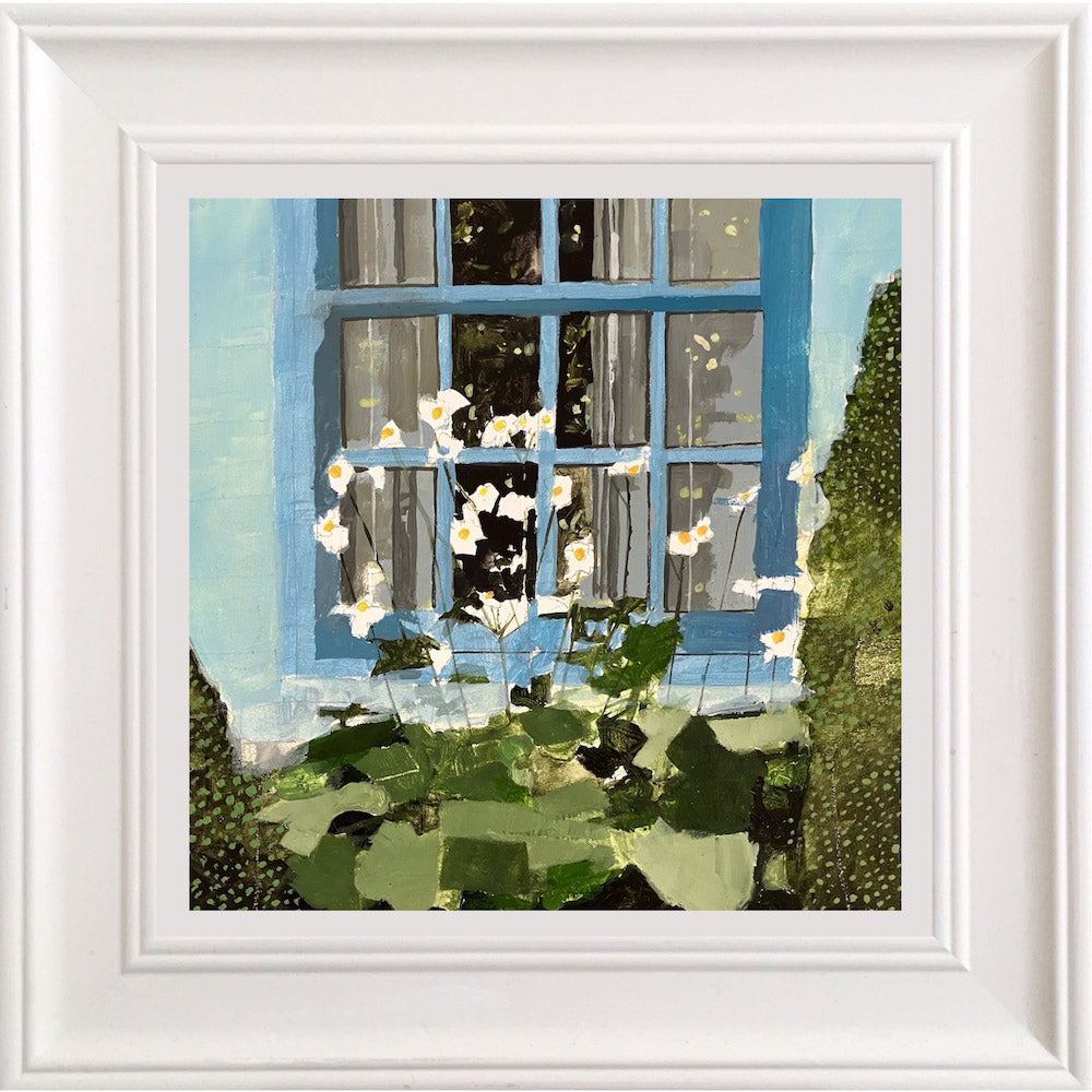 Blue cottage window with daisies