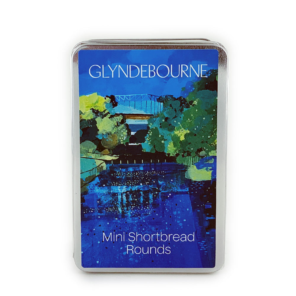 mini shortbread rounds in a tin