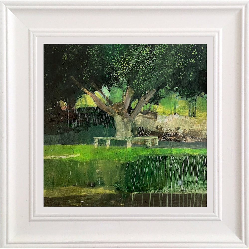 Tree with communal seating by the Lake