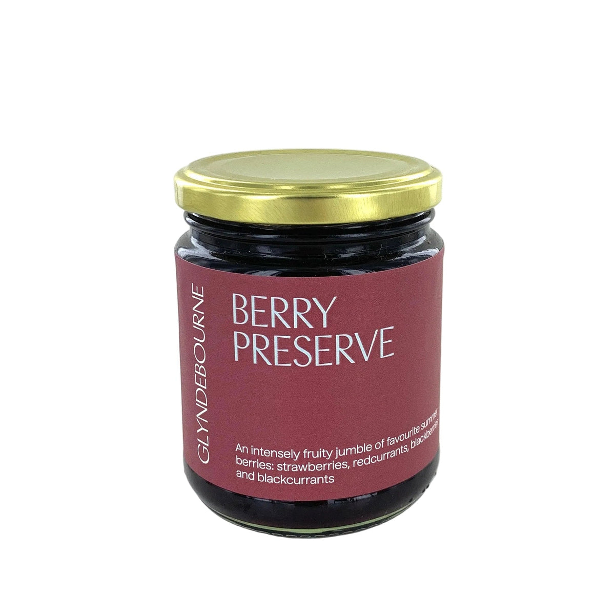 A glass jar of Glandbourne Berry Preserve with a gold metal lid and a dark red label, set against a plain white background.