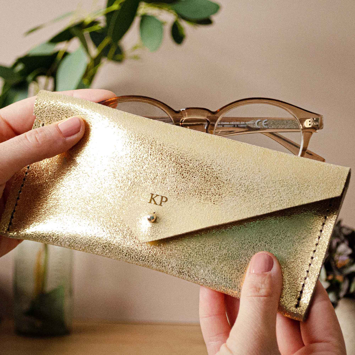 gold glasses case