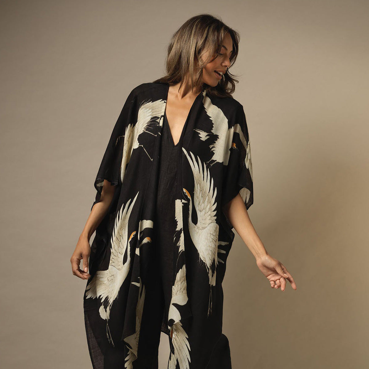 Stork Black Wool Wrap Around